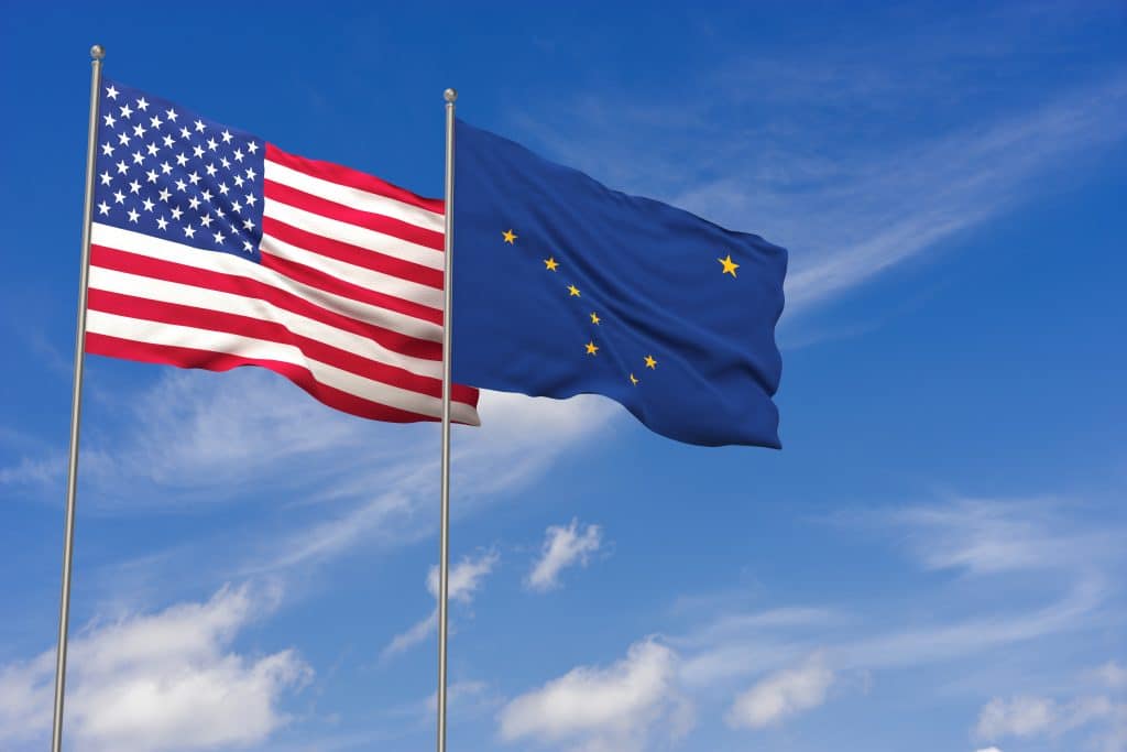 USA and Alaska flags over blue sky background. 3D illustration