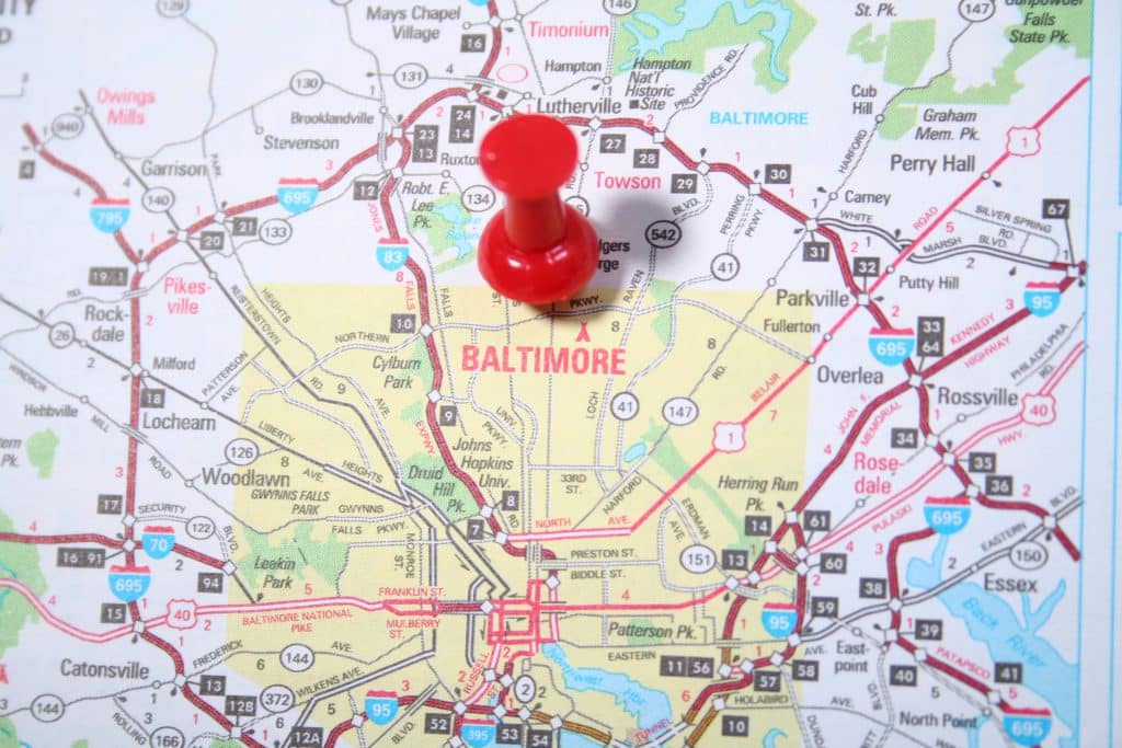 Map with the city of Baltimore, Maryland pinpointed with a red thumb tack